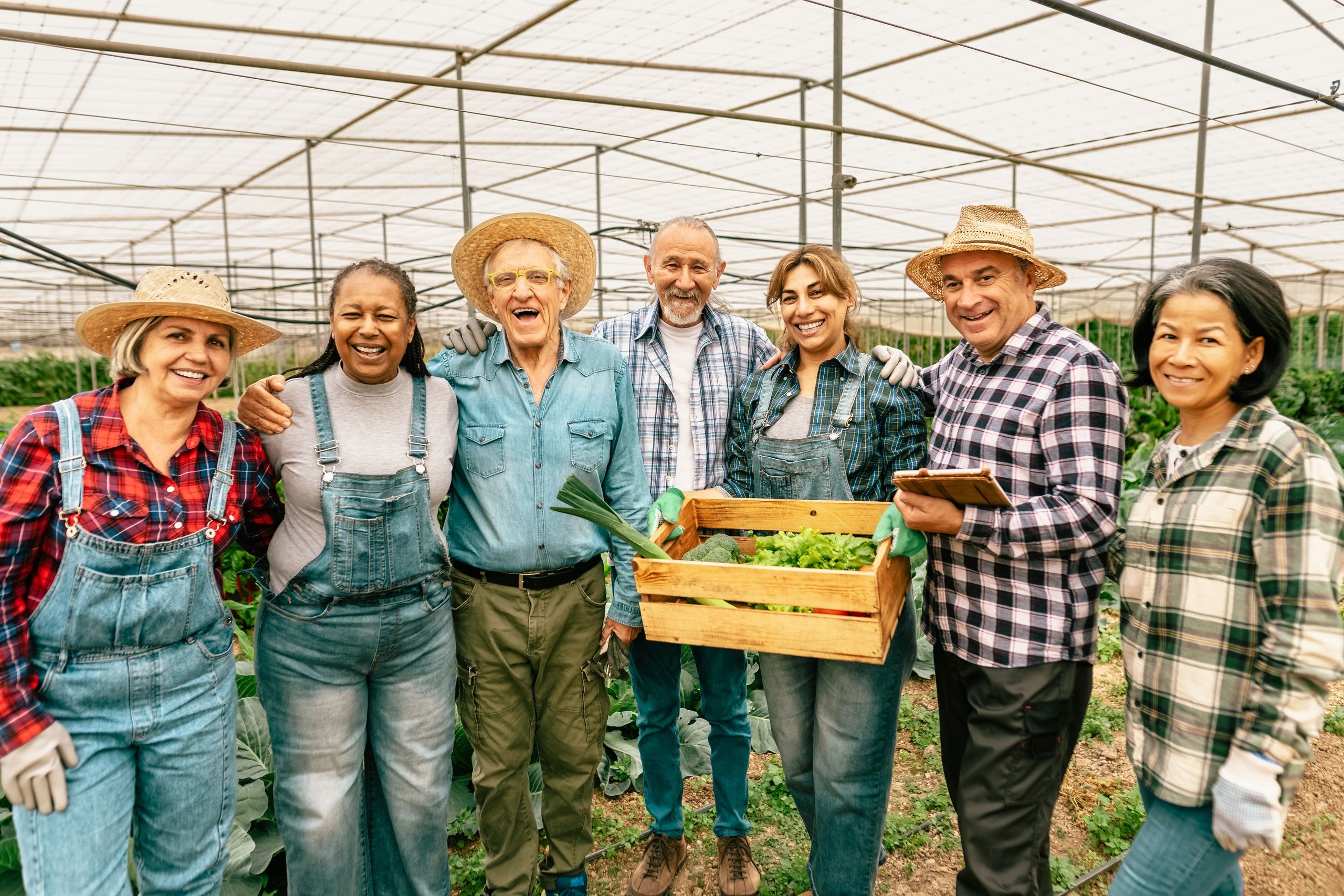 Group of visitors enjoying farming activities